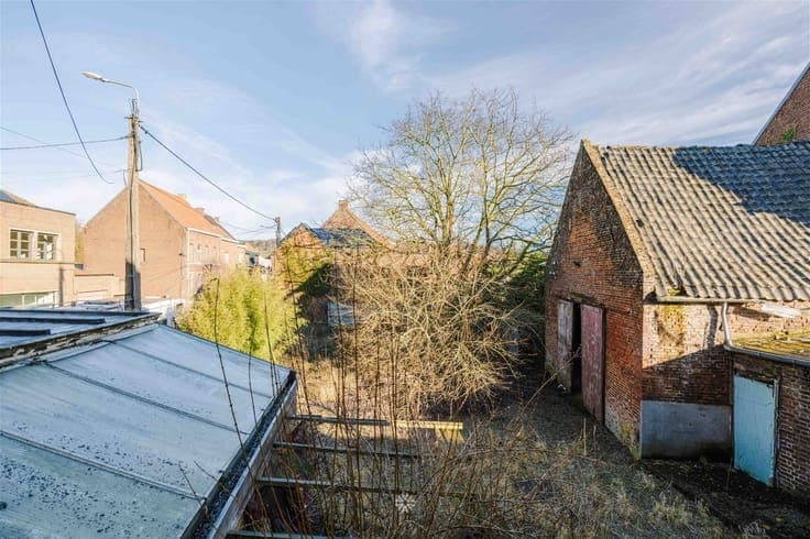 Dubbele woning met enorm renovatie- en investeringspotentiee