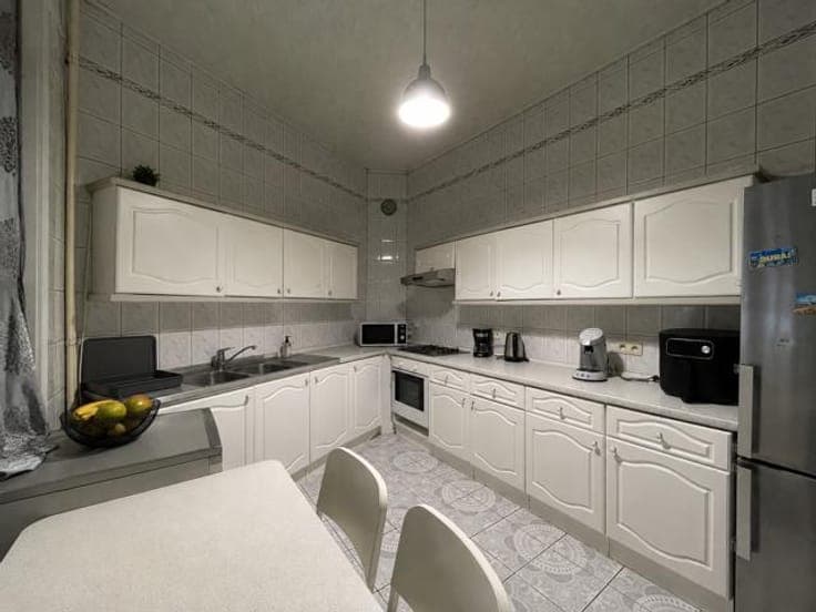 MIXED-USE BUILDING 210M² - 5 BEDROOMS - IDEAL INVESTMENT!