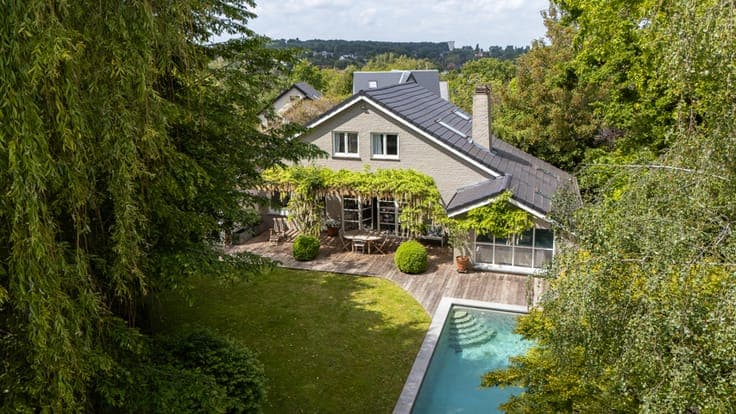 Charming property with pool and lush surroundings
