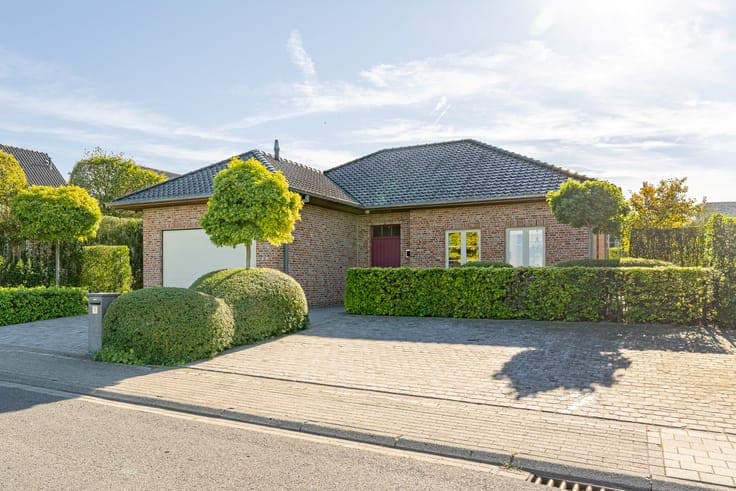 Move-in ready, single-story home with garage and south-faci