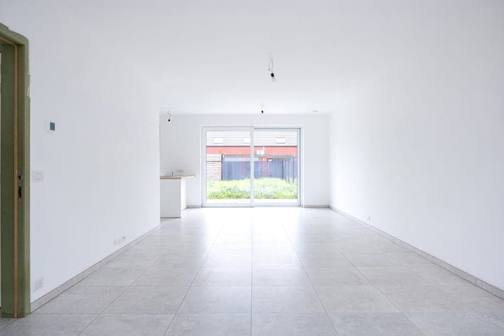 Halfopen woning met ruime tuin op rustige locatie