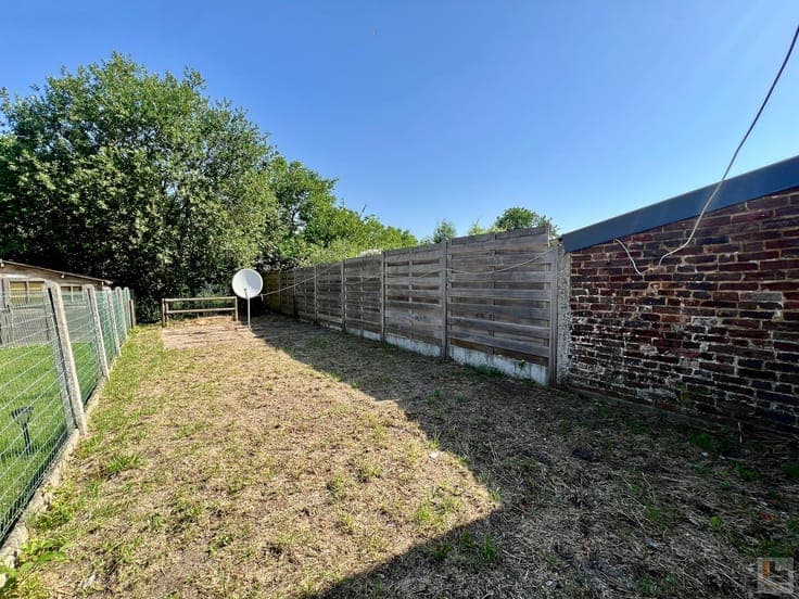 Op te frissen woning met tuin