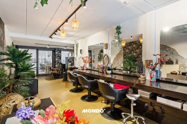 Spacious commercial property with 2 retail spaces, 4 bedroo