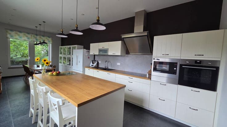 Renovated family home with tree-lined garden and pool