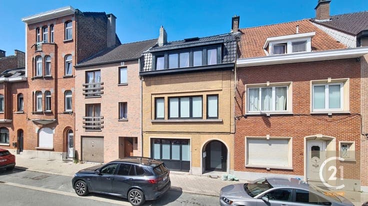 Two-family house/professional practice with great potential