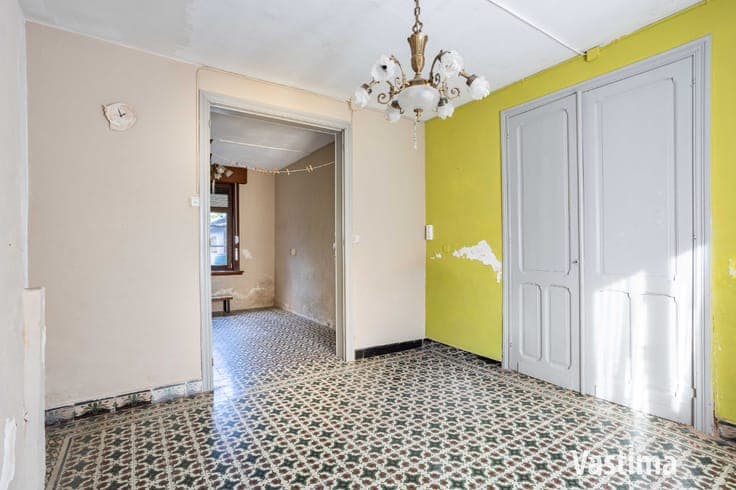 Te renoveren woning met ruime tuin