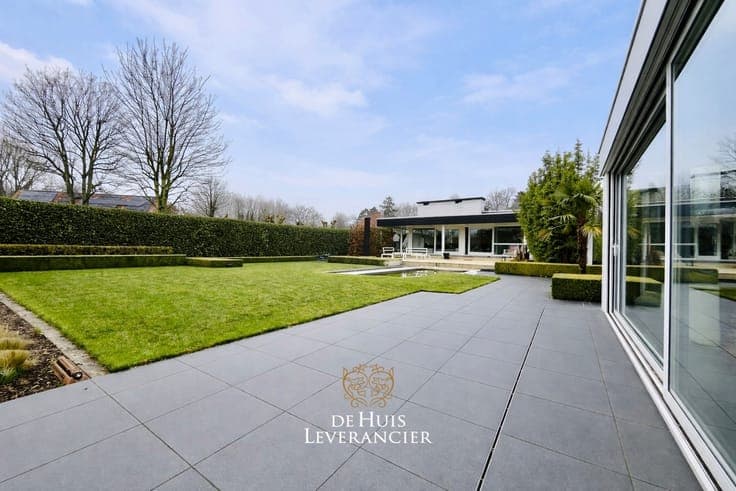 Elegante laagbouwvilla waar discrete rust, moderne uitstr...