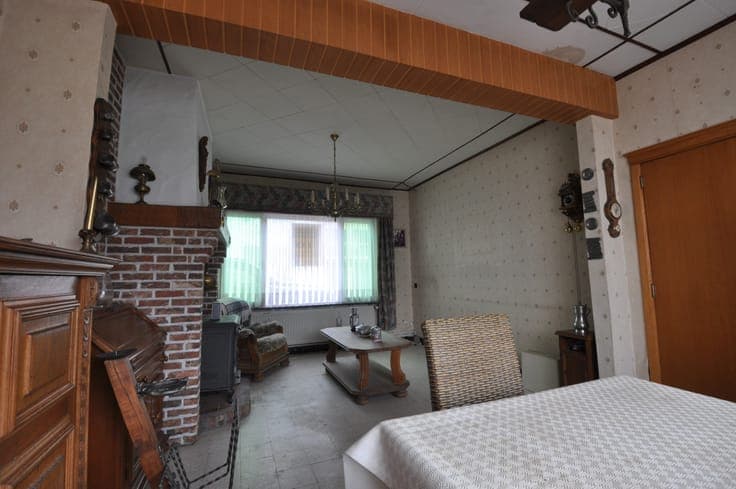 Half-open te renoveren woning te Zandvoorde