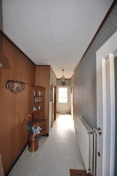 Half-open te renoveren woning te Zandvoorde