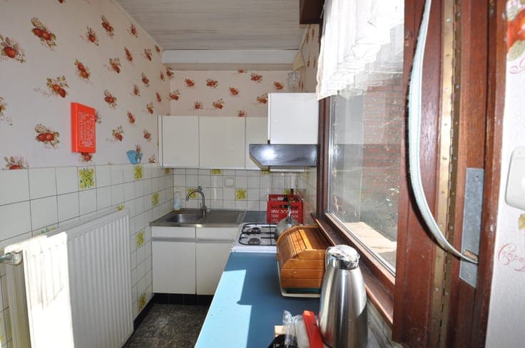 Half-open te renoveren woning te Zandvoorde