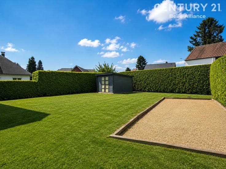 A charming home with a pool and a separate living area