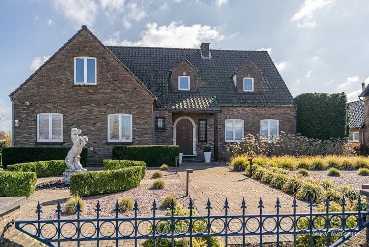 Spacious house with horse stables on approximately 85 acres