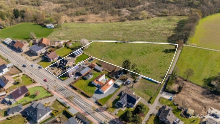 Spacious house with horse stables on approximately 85 acres