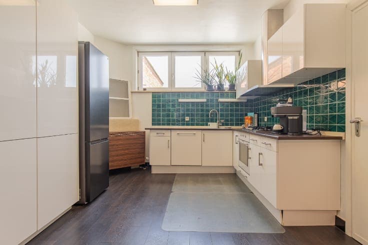 Surprisingly spacious and refined split-level home with e...