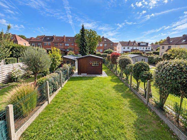A house on the main floor with a south-facing garden, just a