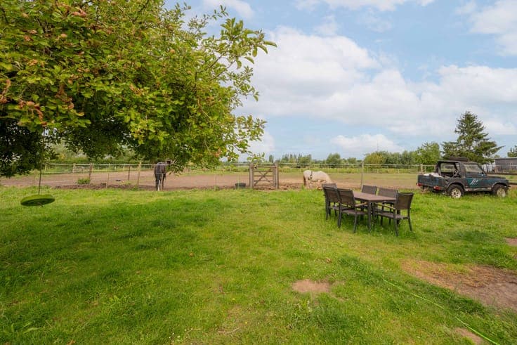 Peaceful living in charming home with 41+ ares of land