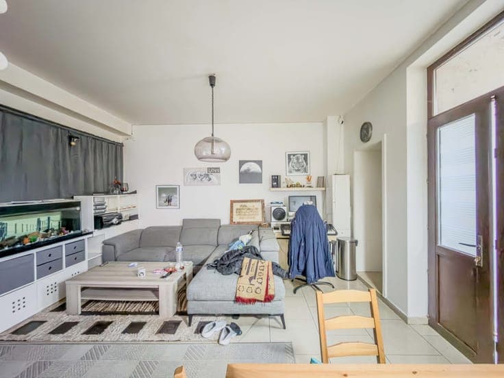 HOUSE CONVERTED INTO A RENTAL PROPERTY