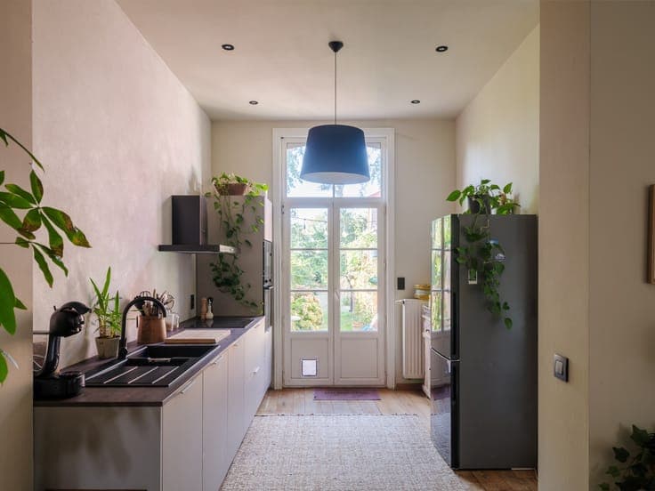 Turnkey home with abundant light and beautiful garden