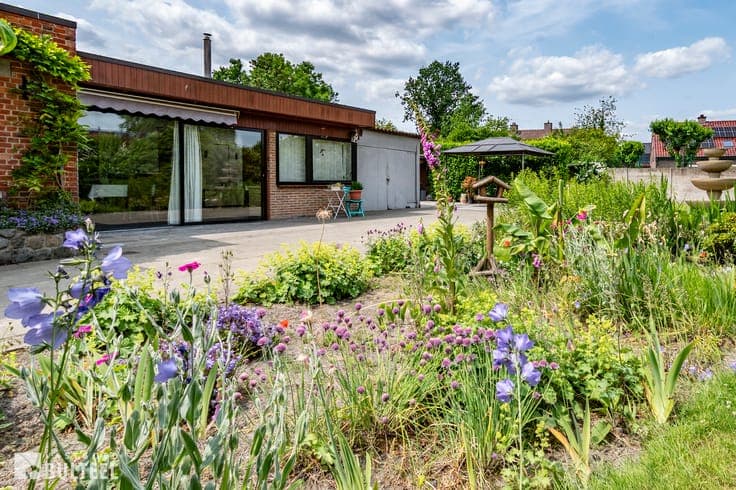 Karaktervolle woning met 5 slaapkamers op mooi perceel.