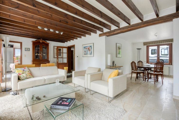 Set-back villa with private driveway and field views