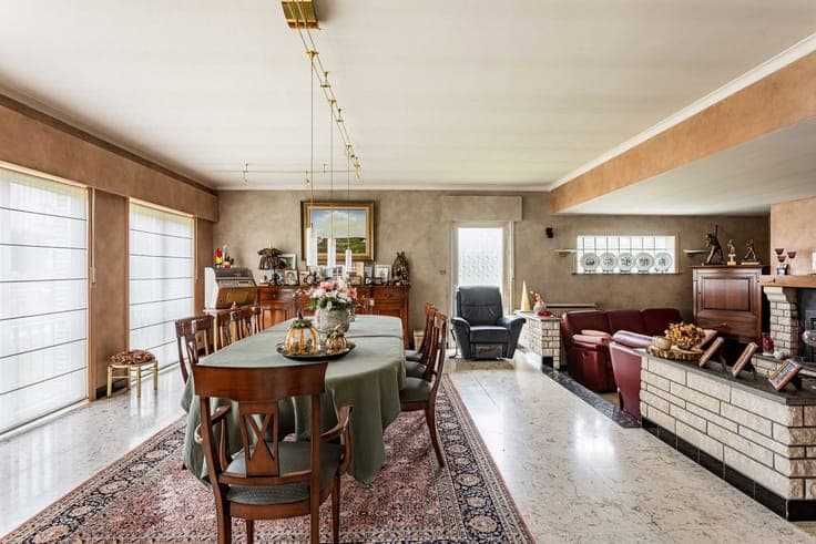 Unique property with driveway, garden & garages.