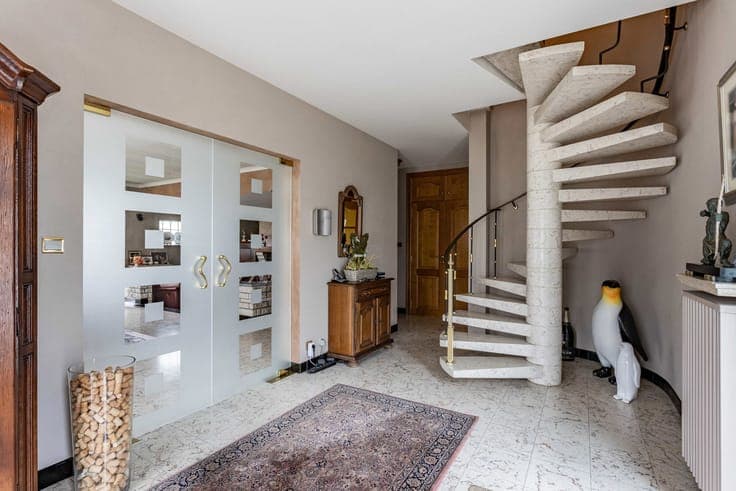Unique property with driveway, garden & garages.