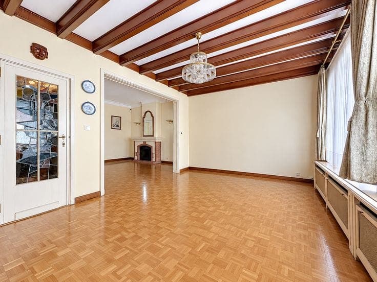 split-level house with garage and garden