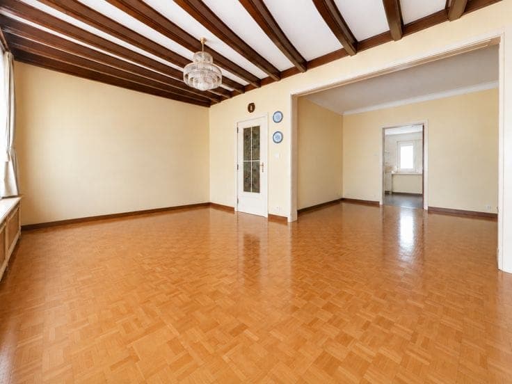 split-level house with garage and garden