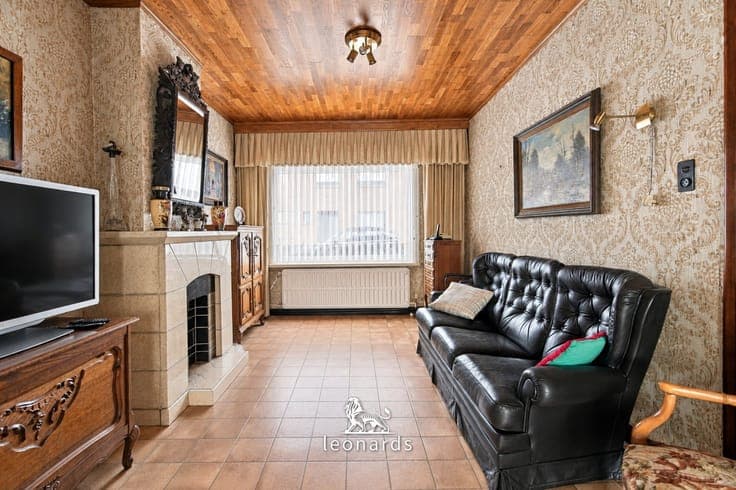 Home to renovate with sunny garden and garage