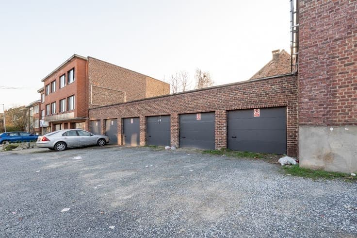 Investment property with 3 app, 1 office & 6 garages