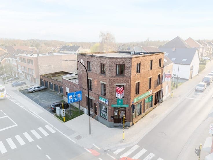 Investment property with 3 app, 1 office & 6 garages