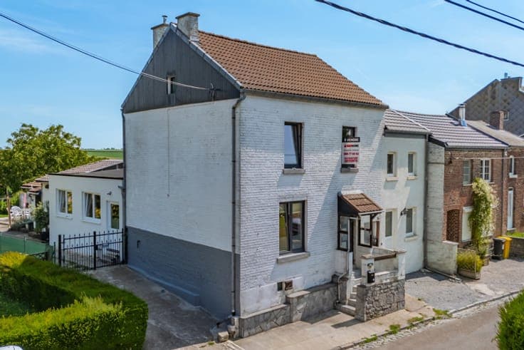 Charmante maison avec garage et jardin