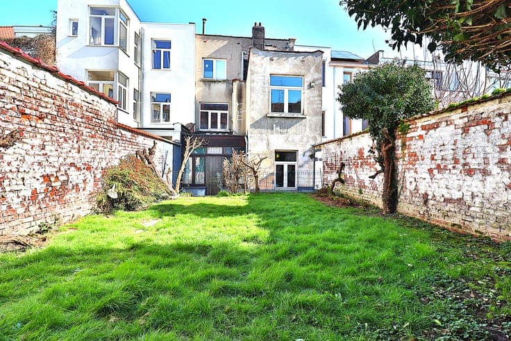 Immeuble de rapport 3 unités + jardin