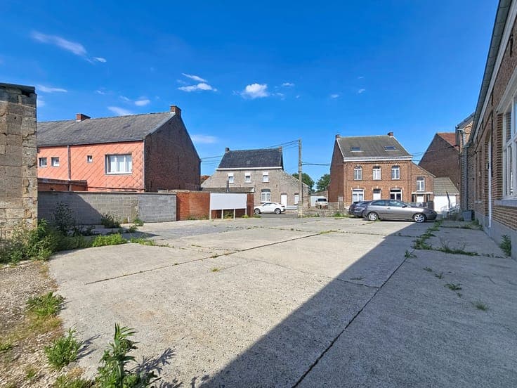 Immeuble de rapport avec 4 logements et 1 commerce/bureau