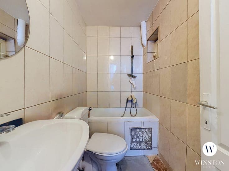 An investment property converted into five flats.