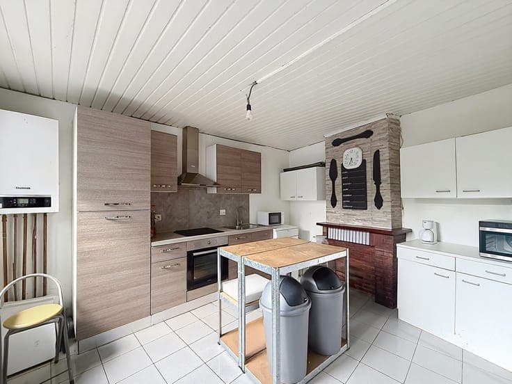 Maison 3 façades à renover située au calme