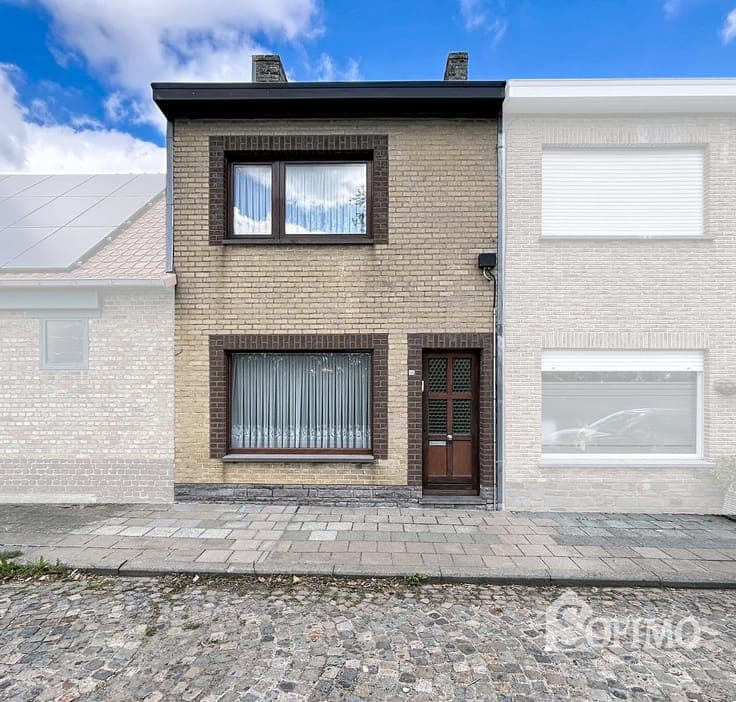 Rijwoning + bouwgrond