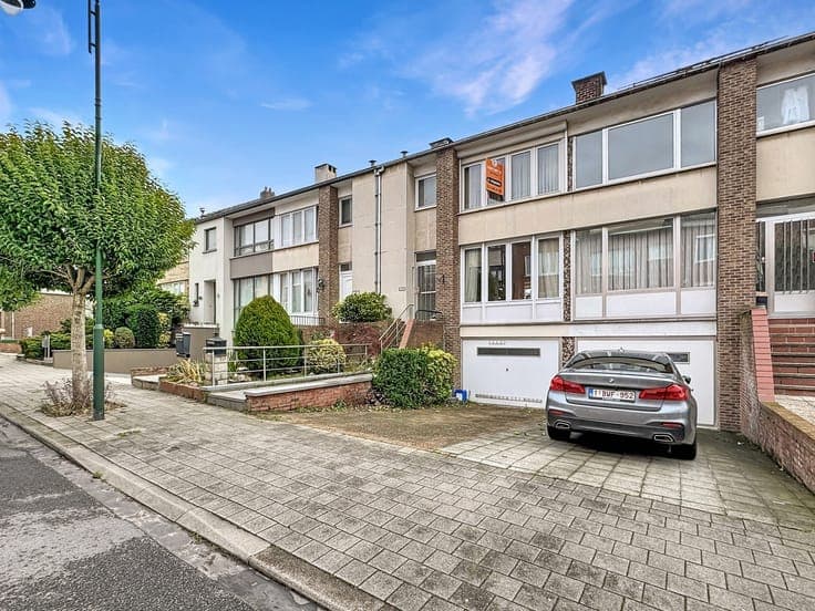3-bedroom house with garden and garage.