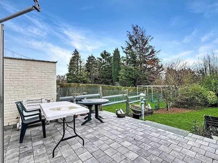 3-bedroom house with garden and garage.