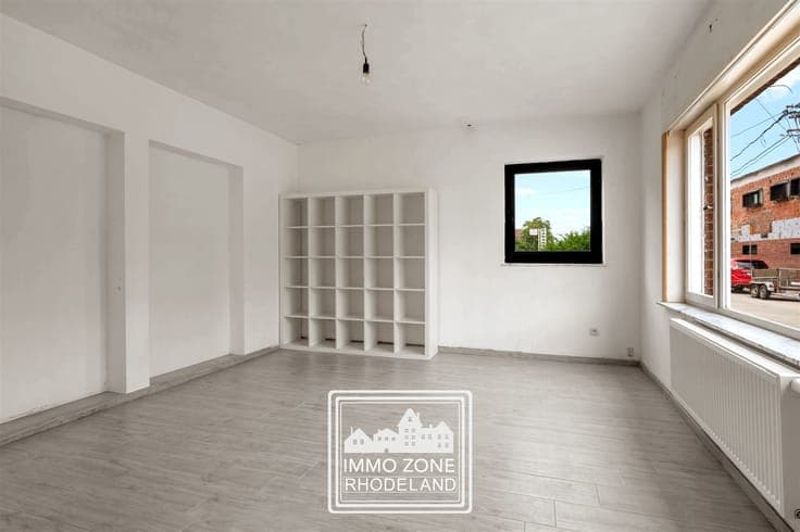 Knappe halfopen woning met 3 slpks en tuin