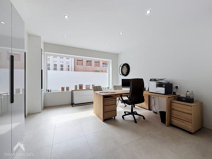 Renovated home with 3 bedrooms, professional space & garden