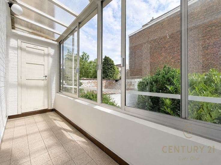 split-level house with garage and garden