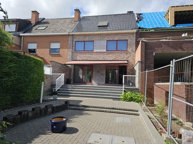 Gunstig gelegen woning met groot terras/tuin + een inpand...