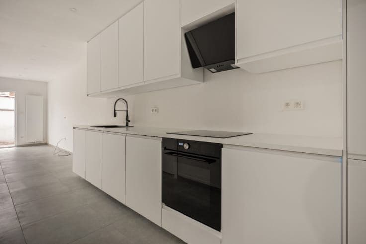 Instapklare & rustig gelegen rijwoning met 4 SLK & stadstuin
