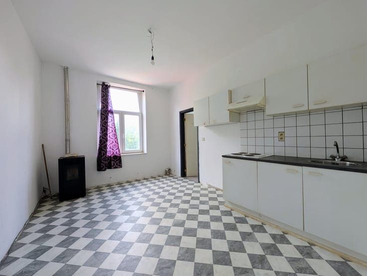 Immeuble de 4 unités dans une rue calme