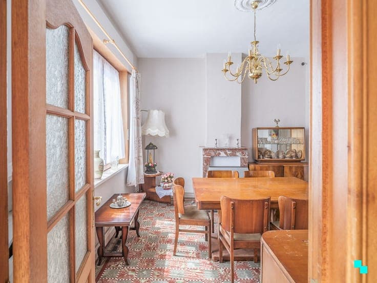Te renoveren woning met gezellige tuin nabij de Bourgoyen