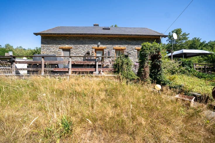 Family home surrounded by nature