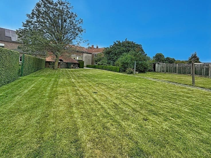 A spacious four-bedroom house with a large storage room in