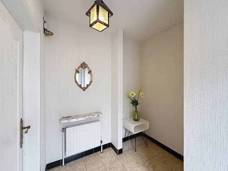 A spacious four-bedroom house with a large storage room in