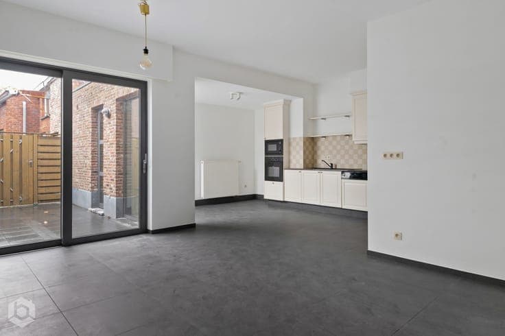 Opbrengsteigendom met 4 app. in het centrum van Berlaar -...